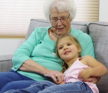 Bobbie Jo Rae pictured as a child with her Grandmother